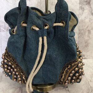 Blue Denim Drawstring Bag with Embellishments